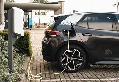 Image of vehicle connected to electric charging point