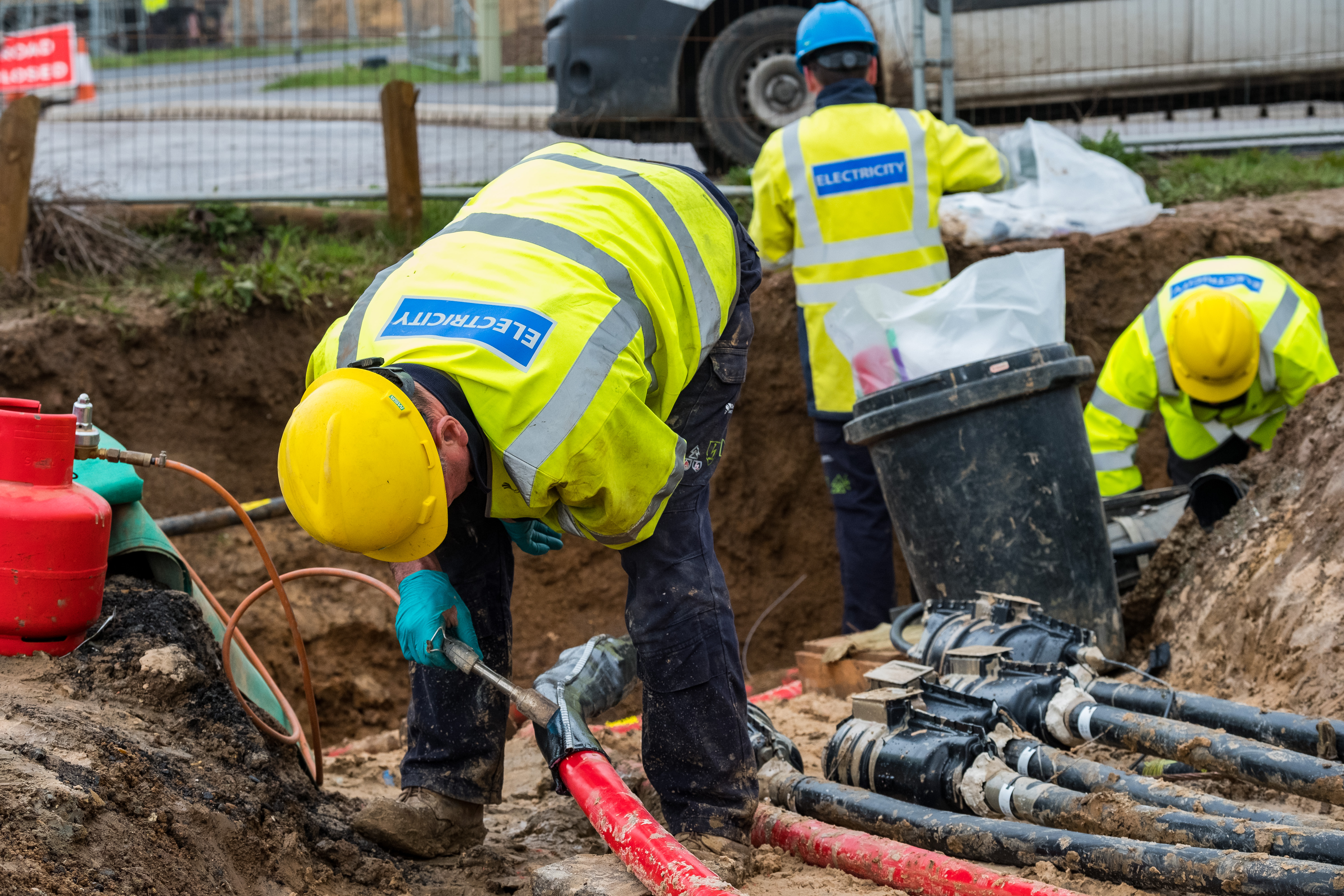 Engineer working on power cable 